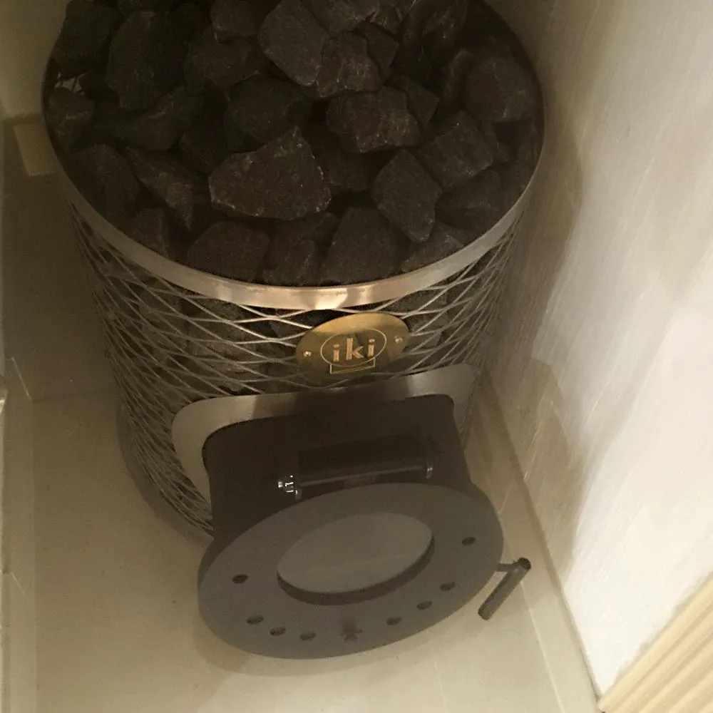 Mini-IKI Wood-Burning Sauna Stove — installed in a sauna
