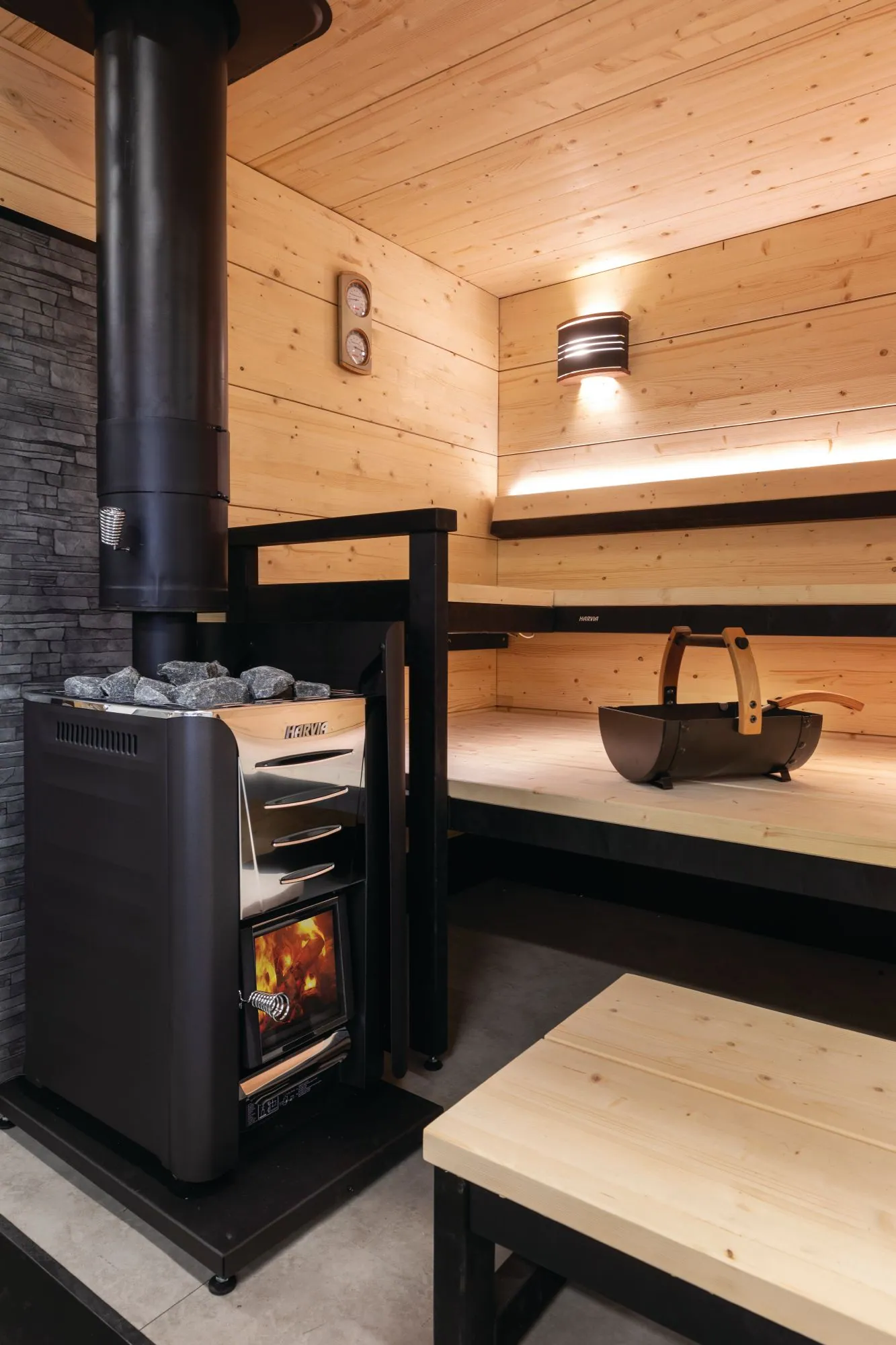 Harvia WL100 Protective Bedding 450 x 665 mm — installed in a sauna