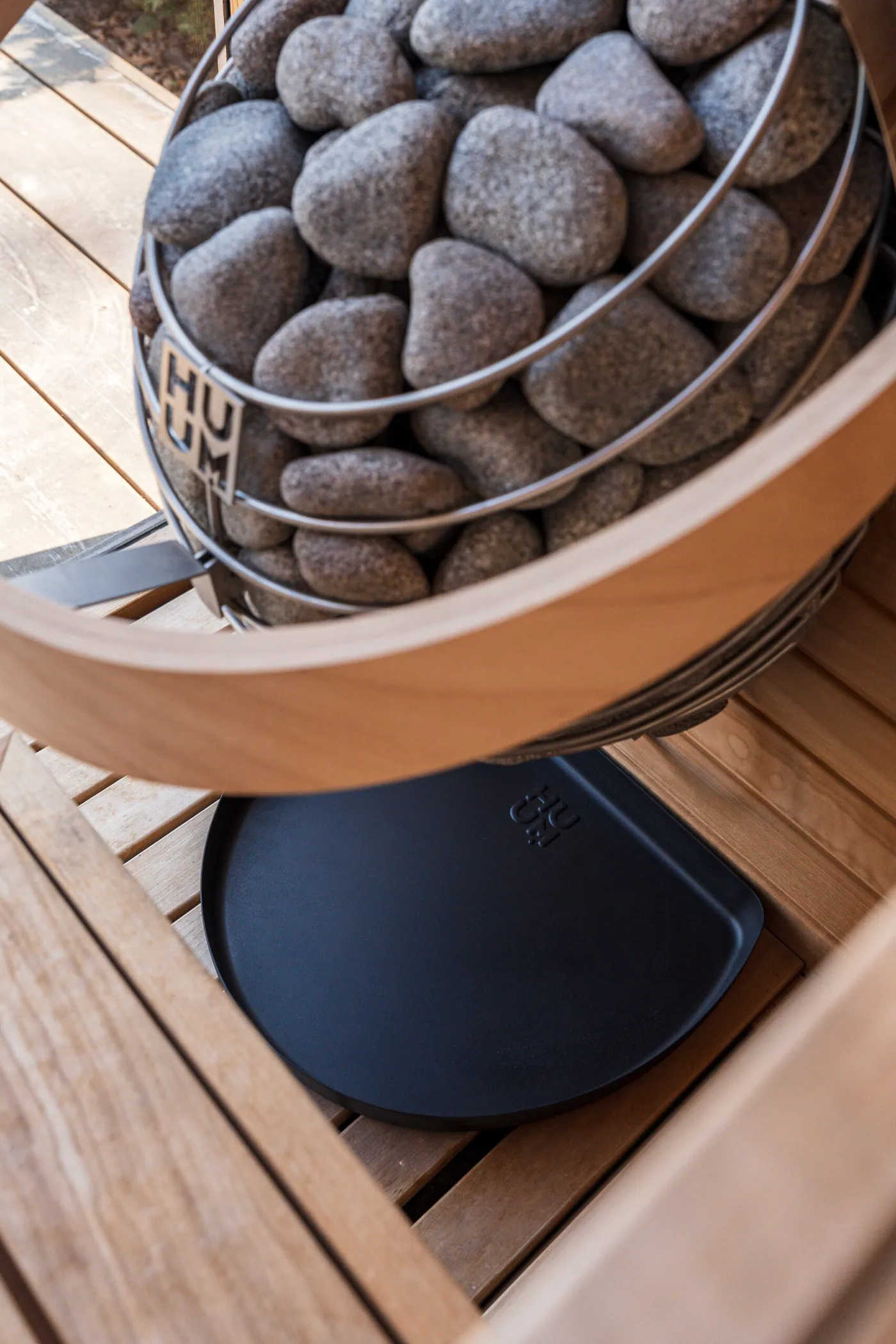 HUUM DROP Drip Tray — installed in a sauna