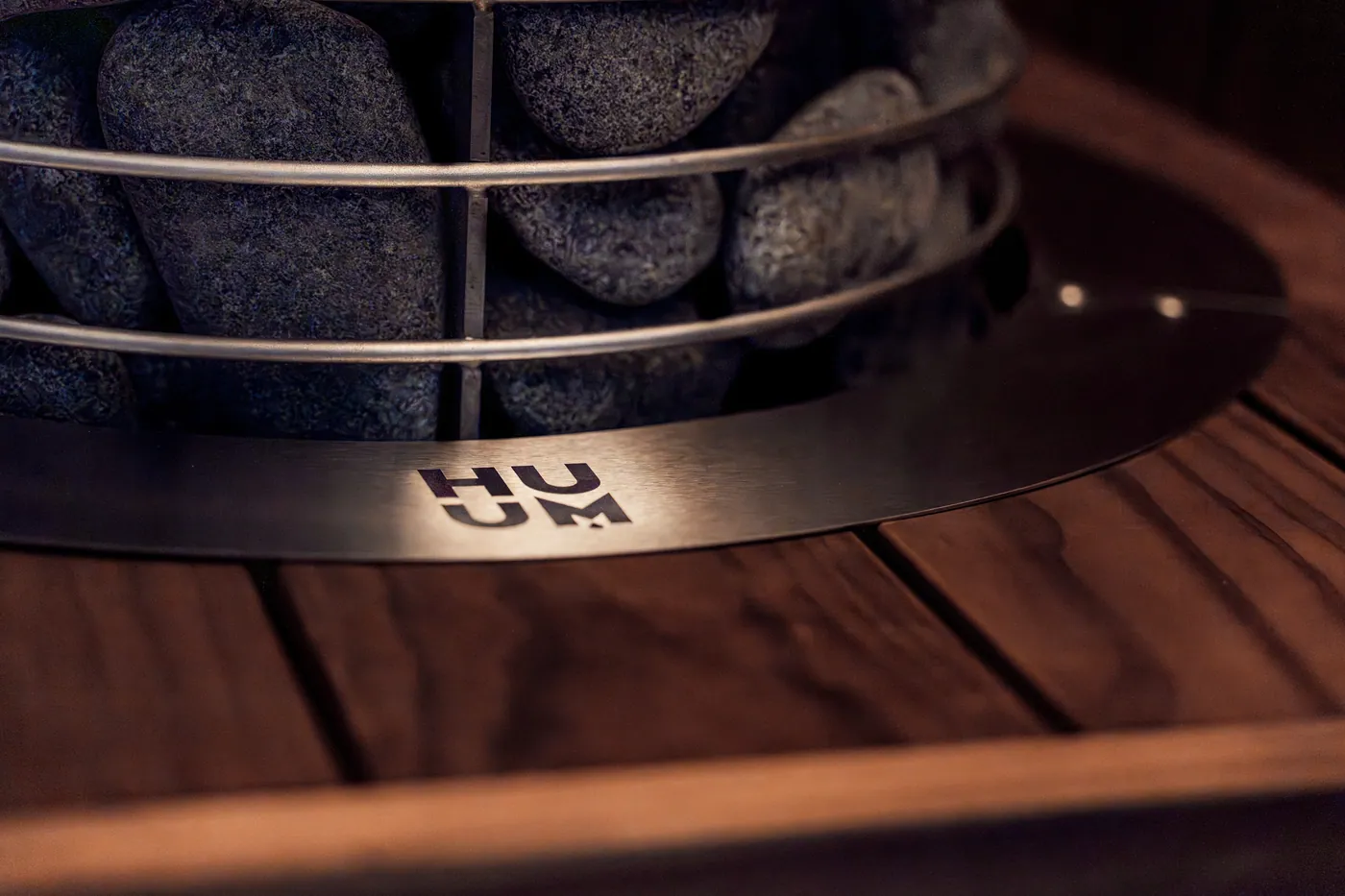 HUUM HIVE Mini Embedding Flange — installed in a sauna