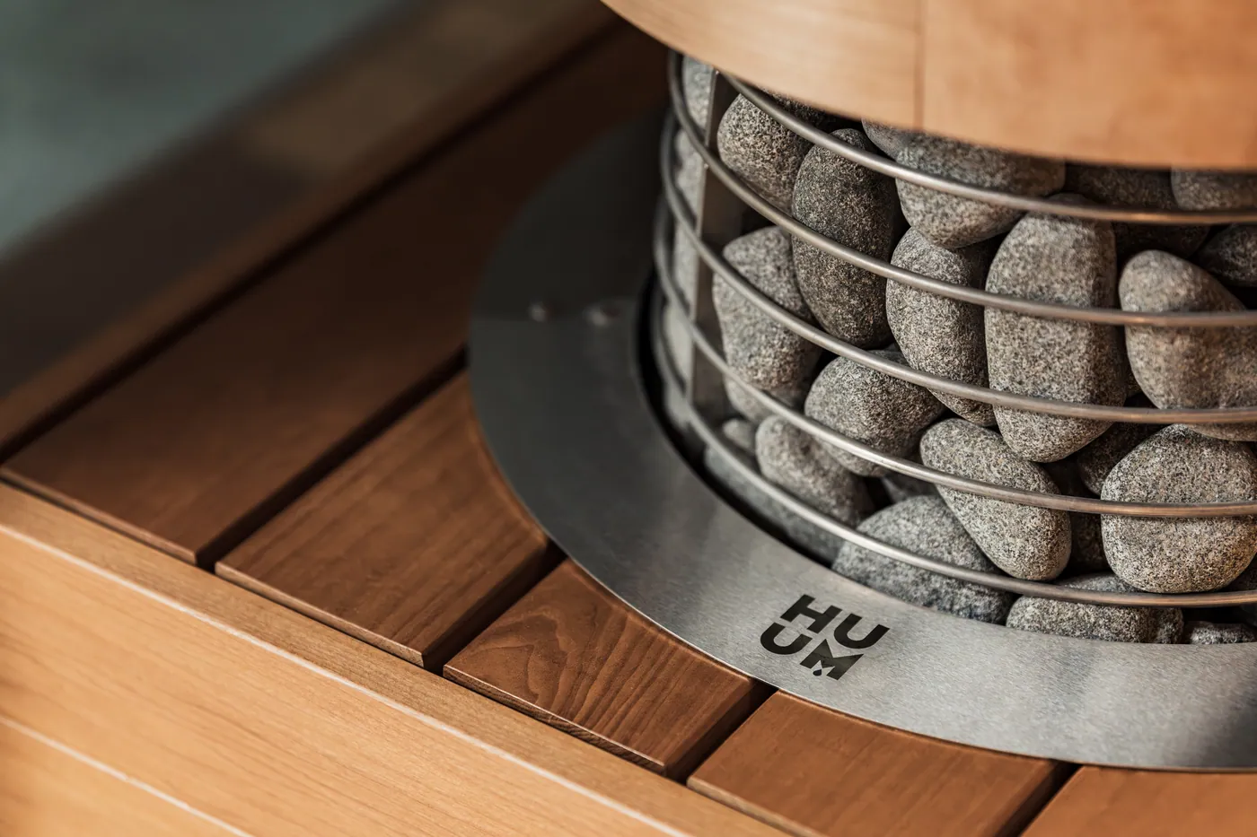 HUUM HIVE Mini Embedding Flange — installed in a sauna