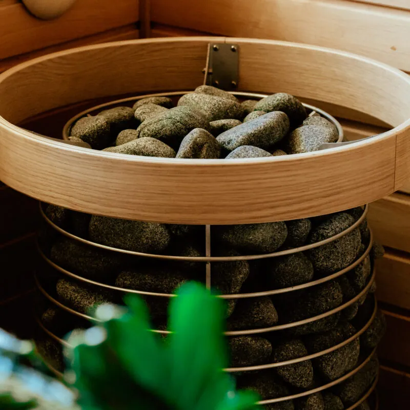 HUUM HIVE Safety Railing — installed in a sauna